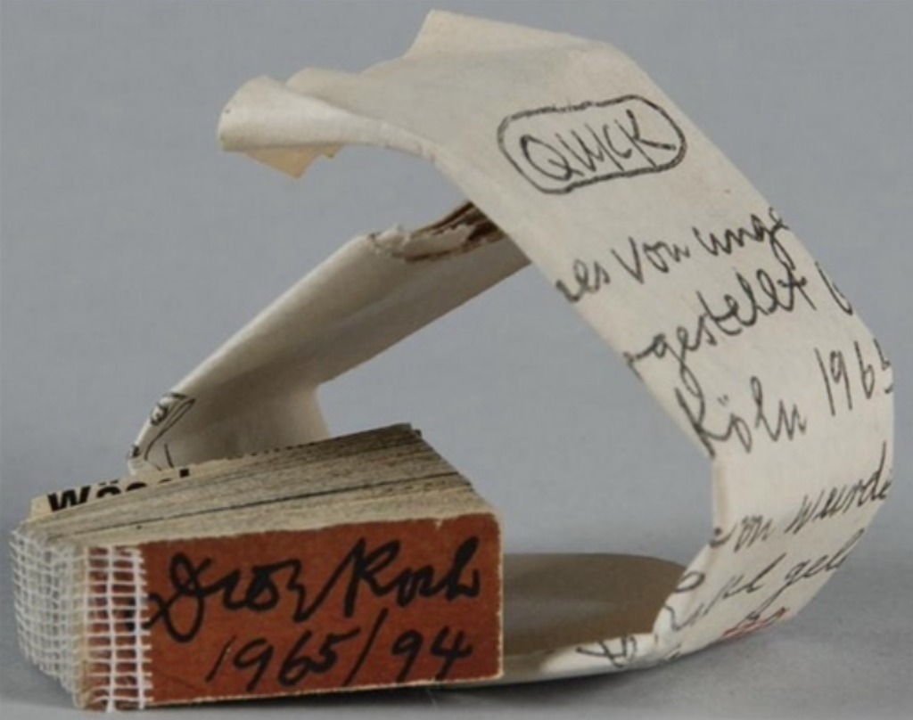 writing on a piece of folded paper. 