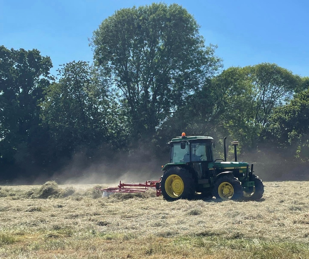 tractor harvesting grain