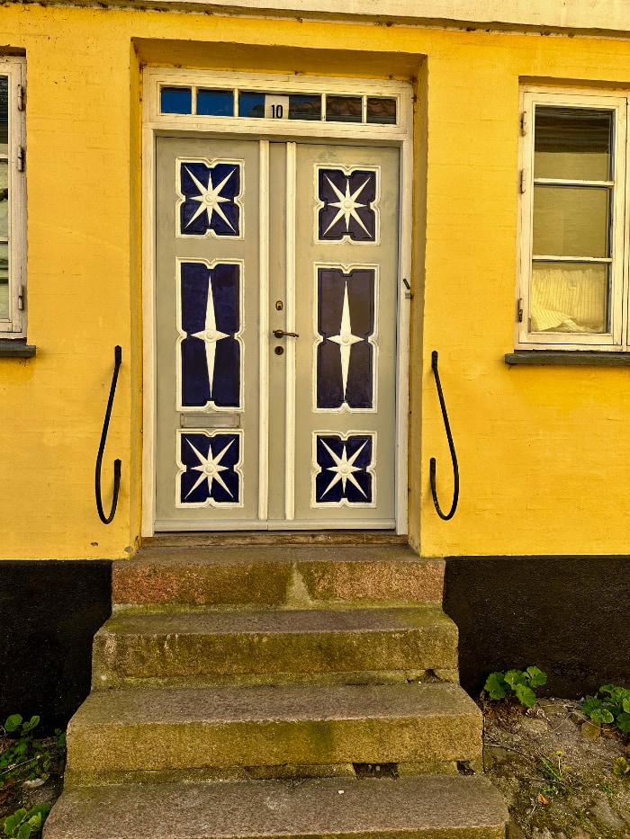 door on a Danish house. Bright yellow and brown traditional colours