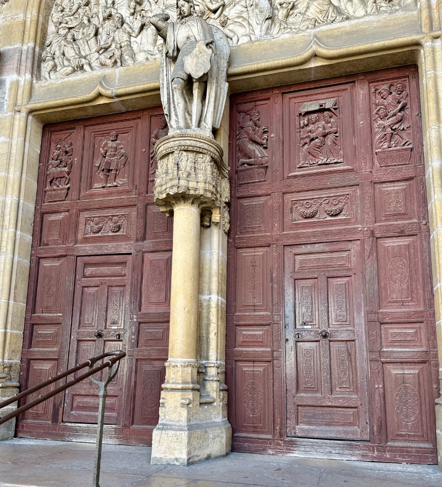 church door at the front of a 16th century church in Dijon France