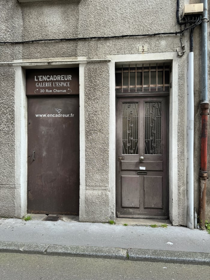 two doors that are brown with wire work