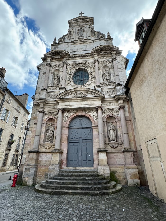 church in Dijon France with double blue door