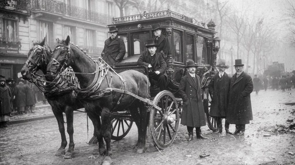 B&W photo image of an 1830s French Diligence carriage with horses, and coachmen