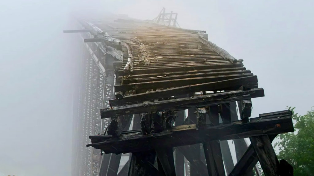 Image of broken bridge in the fog. Infilled aspect.