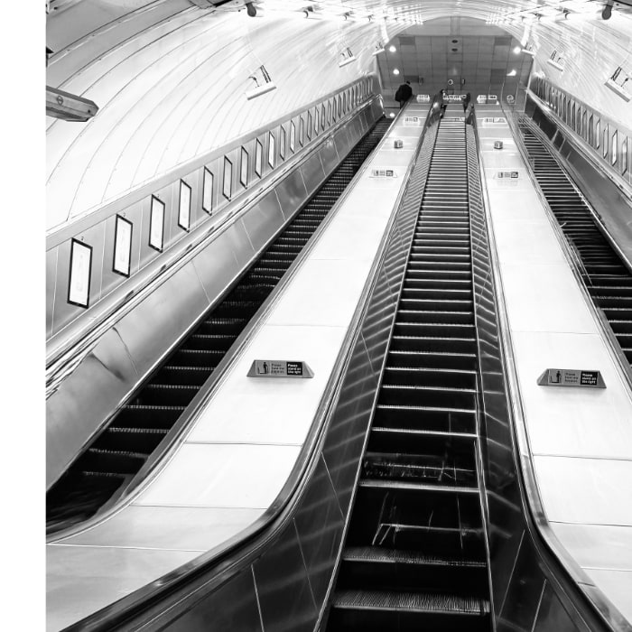 escalator from the London Underground toward street level